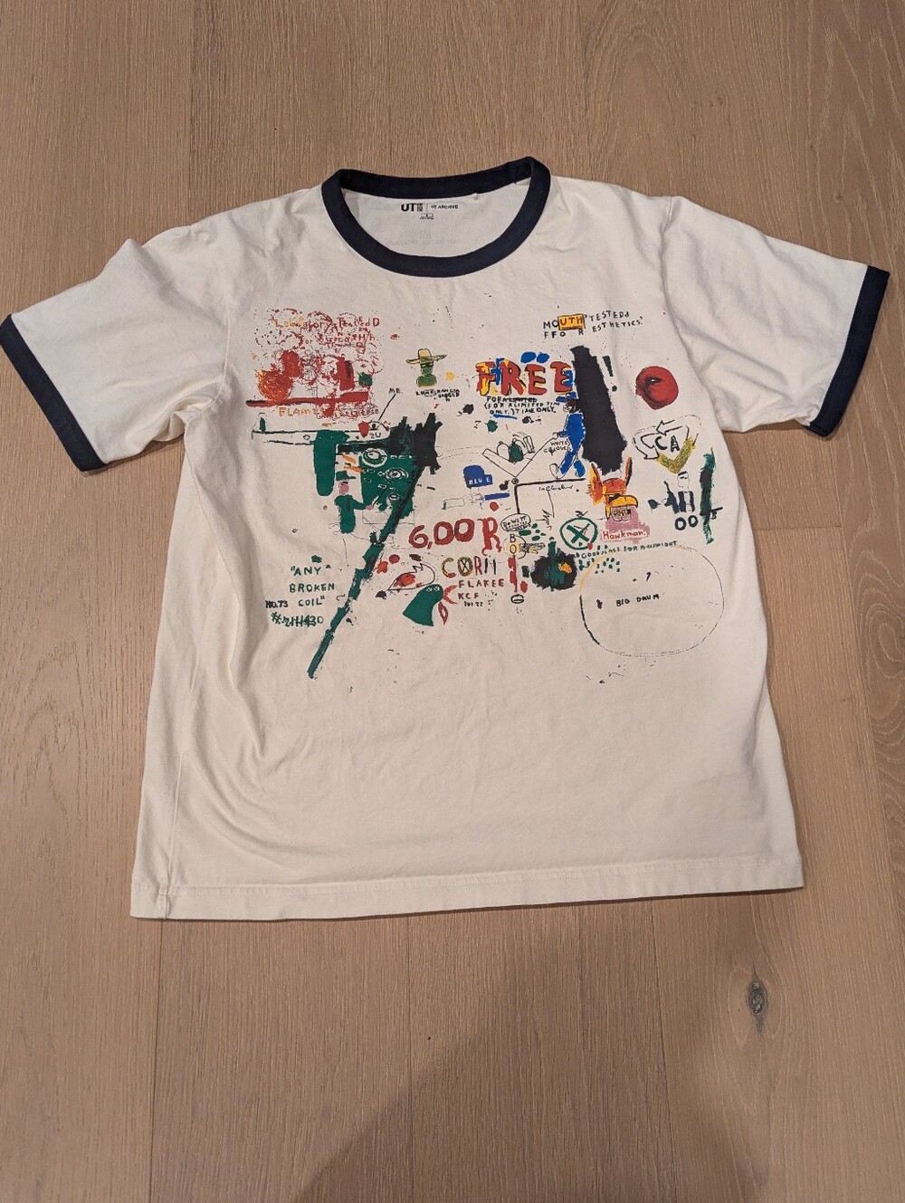 Uniqlo X Jean Michel Basquiat White Graphic Ringer Tee with Navy Trim